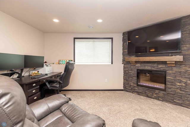 618 23rd Ave W, West Fargo, ND 58078 - home office featuring carpet floors, a stone fireplace, and recessed lighting