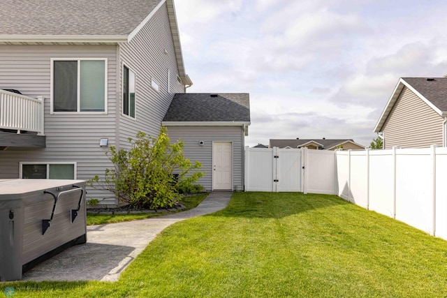 618 23rd Ave W, West Fargo, ND 58078 - fenced backyard with a gate and a hot tub