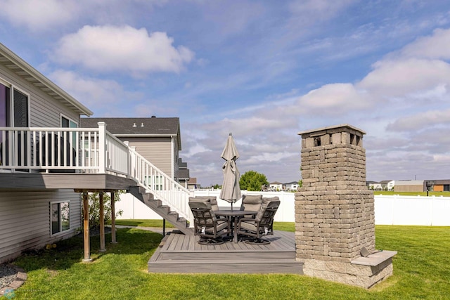 618 23rd Ave W, West Fargo, ND 58078 - view of yard featuring a wooden deck, outdoor dining area, and stairway