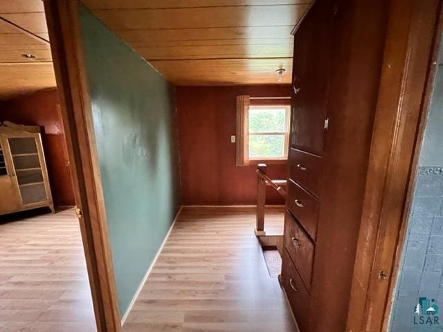 355 Harvey St, Ely, MN 55731 - hall with wood ceiling, wood finished floors, and an upstairs landing
