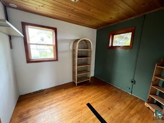 355 Harvey St, Ely, MN 55731 - empty room featuring wooden ceiling and light wood-type flooring