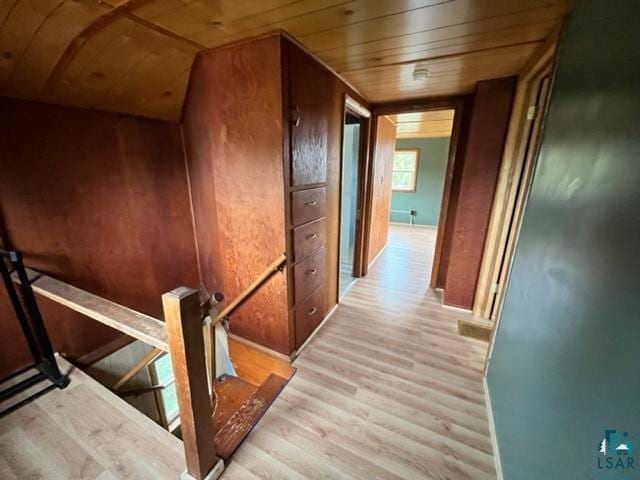 355 Harvey St, Ely, MN 55731 - hall featuring an upstairs landing, light wood-style flooring, and wood ceiling