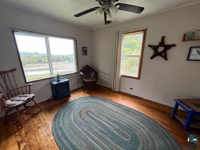 355 Harvey St, Ely, MN 55731 - sitting room featuring light wood-style floors and ceiling fan