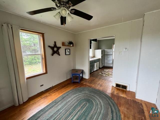 355 Harvey St, Ely, MN 55731 - empty room with wood finished floors and a ceiling fan