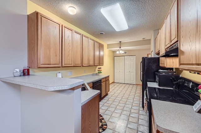 11182 204th St W Unit 908, Lakeville, MN 55044 - kitchen with black appliances, under cabinet range hood, a peninsula, a textured ceiling, and light countertops