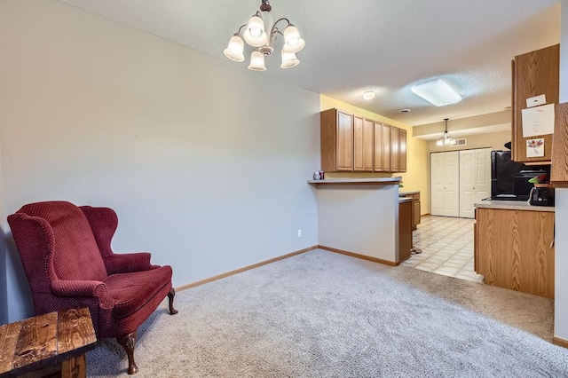 11182 204th St W Unit 908, Lakeville, MN 55044 - kitchen featuring a chandelier, light carpet, brown cabinetry, refrigerator, and light countertops