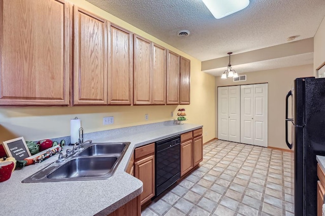 11182 204th St W Unit 908, Lakeville, MN 55044 - kitchen featuring black appliances, a textured ceiling, light countertops, decorative light fixtures, and a chandelier