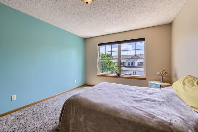 11182 204th St W Unit 908, Lakeville, MN 55044 - bedroom with carpet flooring and a textured ceiling