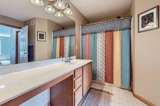 11182 204th St W Unit 908, Lakeville, MN 55044 - bathroom featuring tile patterned floors, vanity, and a shower with curtain