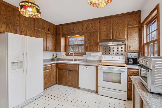 300 Diamond Lake Rd, Minneapolis, MN 55419 - kitchen featuring white appliances, under cabinet range hood, light flooring, and light countertops