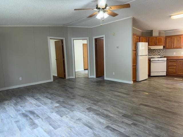19531 Explorer Trl, Todd Twp, MN 56470 - unfurnished living room featuring ornamental molding, ceiling fan, dark wood-type flooring, and a textured ceiling