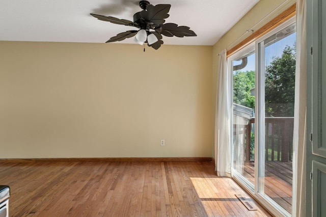 723 2nd Ave S, Buffalo, MN 55313 - unfurnished room with light wood-style flooring and a ceiling fan