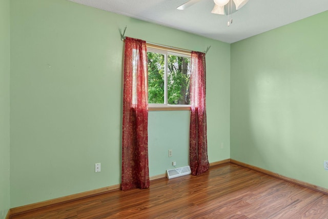 723 2nd Ave S, Buffalo, MN 55313 - unfurnished room with ceiling fan and wood finished floors