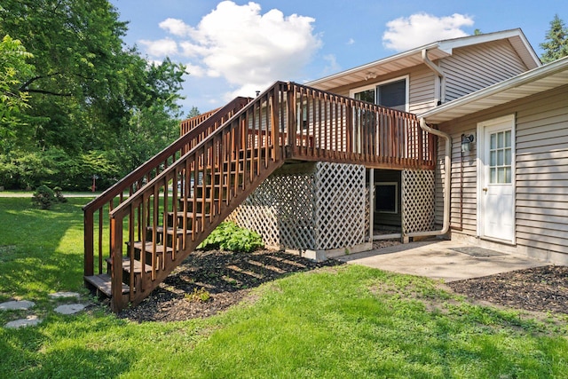 723 2nd Ave S, Buffalo, MN 55313 - back of property with a yard, a deck, stairway, and a patio