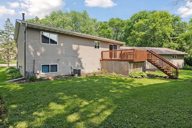 723 2nd Ave S, Buffalo, MN 55313 - back of house with a wooden deck, stairway, and a lawn