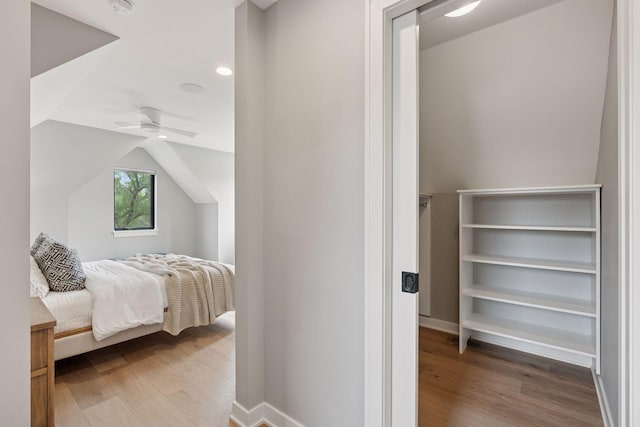 2820 Saint Louis Ave, Minneapolis, MN 55416 - bedroom featuring wood finished floors, ceiling fan, and vaulted ceiling