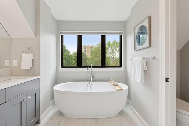 2820 Saint Louis Ave, Minneapolis, MN 55416 - full bath featuring vanity and a freestanding tub