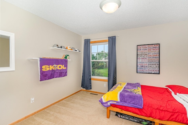 15265 Dupont Path, Apple Valley, MN 55124 - carpeted bedroom with baseboards and a textured ceiling