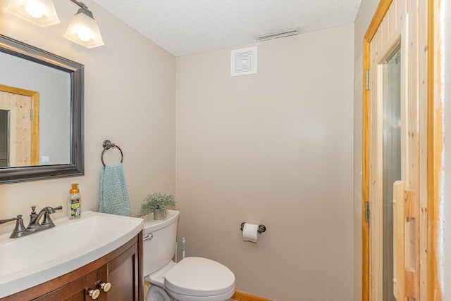 15265 Dupont Path, Apple Valley, MN 55124 - half bath featuring vanity and a textured ceiling