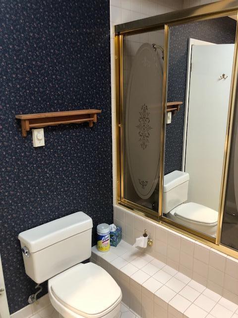 300 Whittier St W, Lanesboro, MN 55949 - full bath with wallpapered walls and a stall shower
