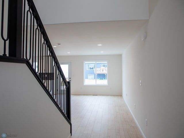 7901 Lost River Rd, Horace, ND 58047 - stairs featuring wood finished floors and recessed lighting
