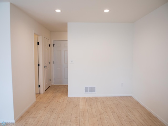 7901 Lost River Rd, Horace, ND 58047 - spare room with light wood-style floors and recessed lighting