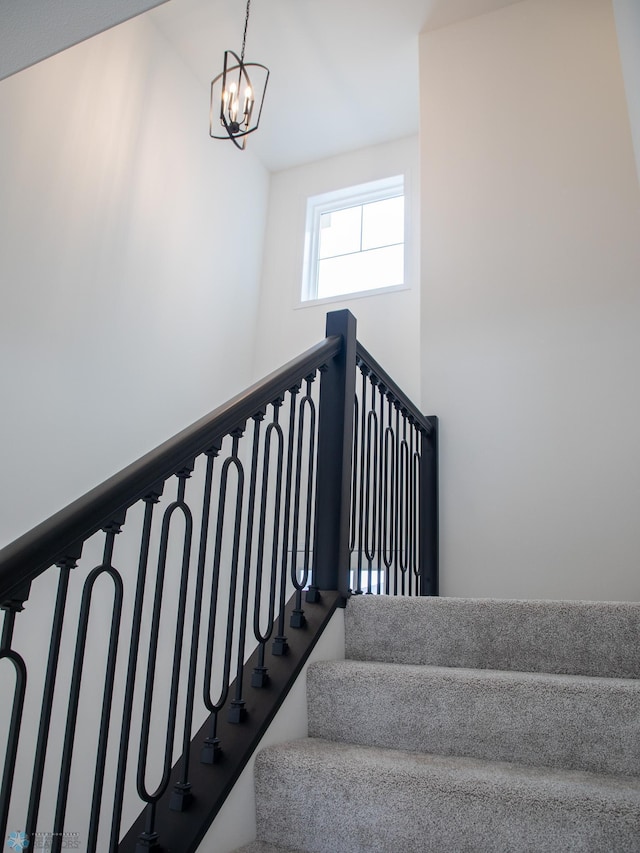 7901 Lost River Rd, Horace, ND 58047 - stairs with a chandelier