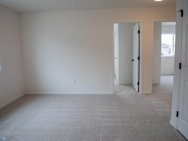 7901 Lost River Rd, Horace, ND 58047 - empty room featuring carpet floors and baseboards