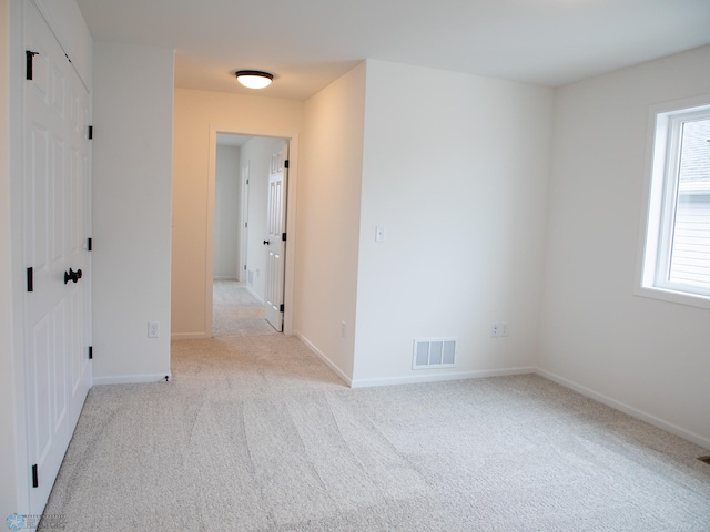 7901 Lost River Rd, Horace, ND 58047 - carpeted empty room with baseboards