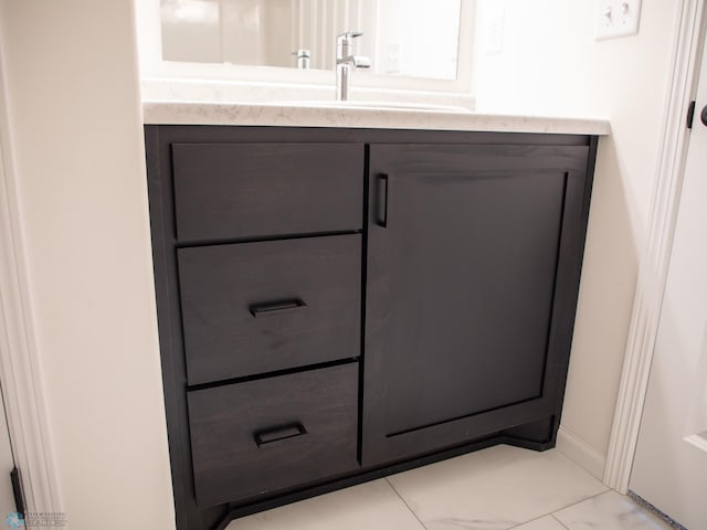 7901 Lost River Rd, Horace, ND 58047 - bathroom view of vanity and baseboards