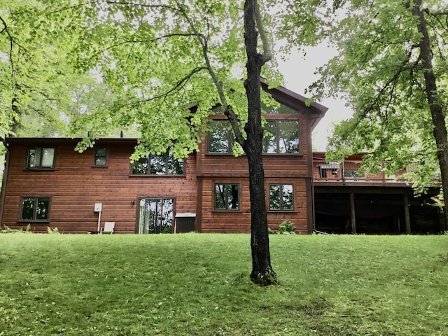 17136 Hidden Lake Rd, Fifty Lakes, MN 56448 - rear view of property featuring a lawn and a deck