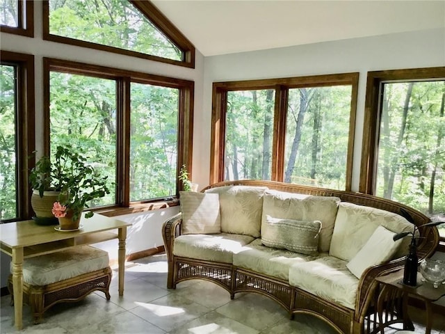 17136 Hidden Lake Rd, Fifty Lakes, MN 56448 - sunroom / solarium featuring lofted ceiling, plenty of natural light, and tile patterned floors