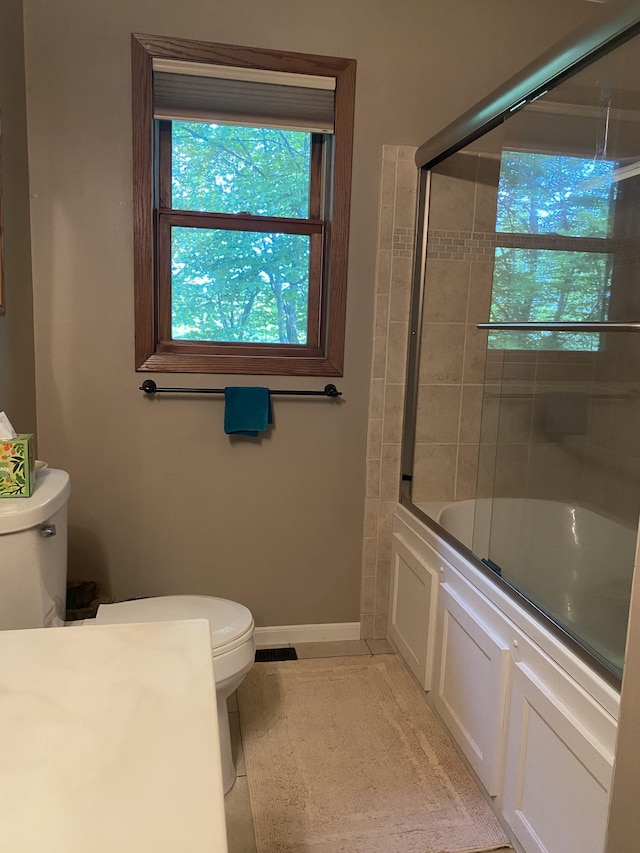 17136 Hidden Lake Rd, Fifty Lakes, MN 56448 - bathroom with bath / shower combo with glass door and tile patterned flooring
