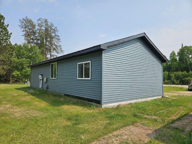 10091 Trengove Rd NW, Bemidji, MN 56601 - view of side of property with a lawn