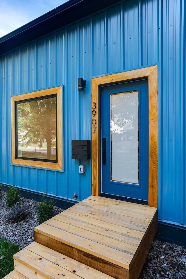 3909 Xerxes Ave S, Minneapolis, MN 55410 - doorway to property featuring board and batten siding
