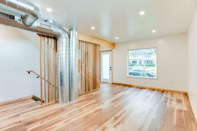 3909 Xerxes Ave S, Minneapolis, MN 55410 - unfurnished living room featuring wood finished floors and recessed lighting
