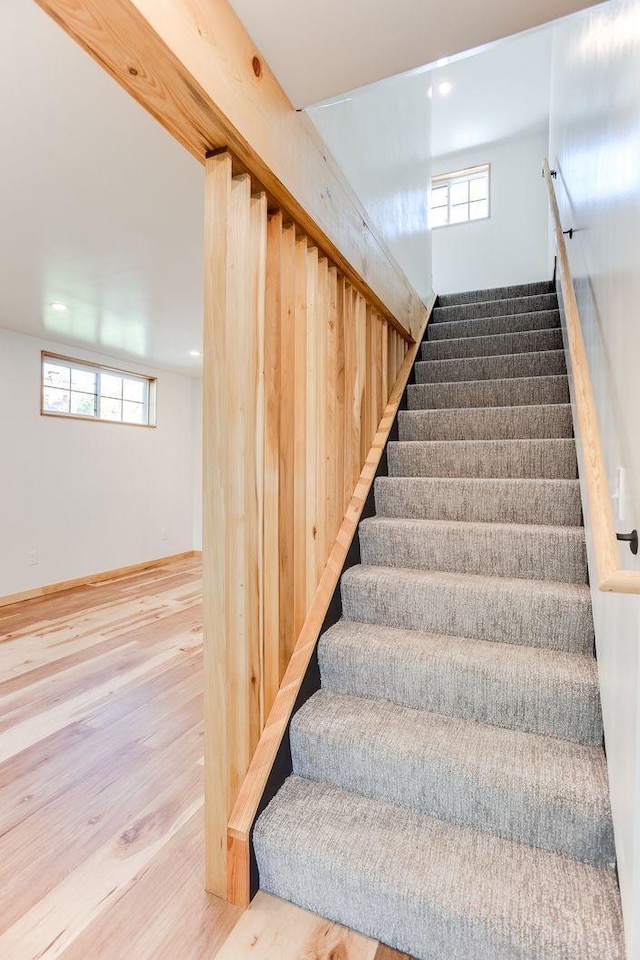 3909 Xerxes Ave S, Minneapolis, MN 55410 - stairway featuring wood finished floors, healthy amount of natural light, and recessed lighting