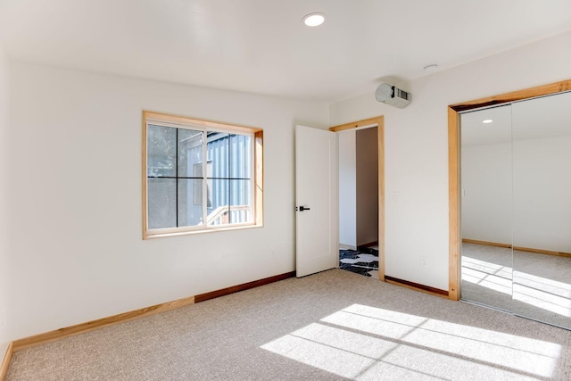 3909 Xerxes Ave S, Minneapolis, MN 55410 - unfurnished bedroom with carpet, a closet, and recessed lighting