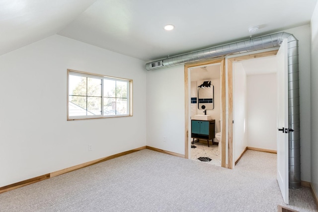 3909 Xerxes Ave S, Minneapolis, MN 55410 - unfurnished bedroom featuring light carpet, ensuite bathroom, and vaulted ceiling