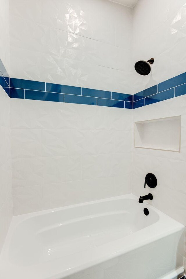 3909 Xerxes Ave S, Minneapolis, MN 55410 - full bathroom featuring washtub / shower combination