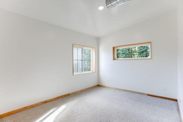 3909 Xerxes Ave S, Minneapolis, MN 55410 - unfurnished room with carpet floors and vaulted ceiling