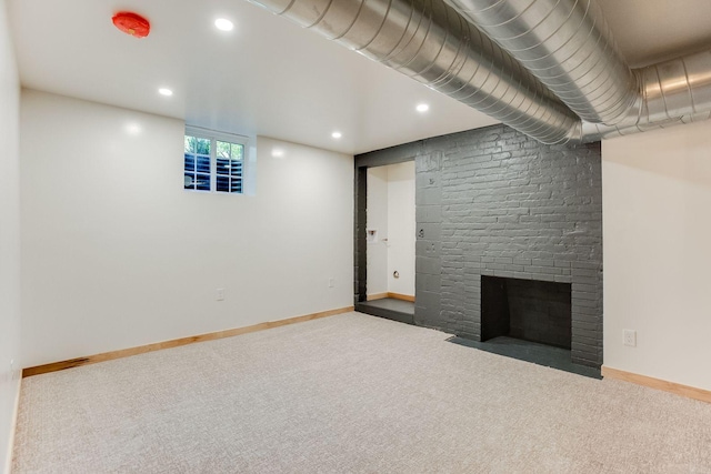 3909 Xerxes Ave S, Minneapolis, MN 55410 - unfurnished living room featuring carpet flooring, a brick fireplace, and recessed lighting