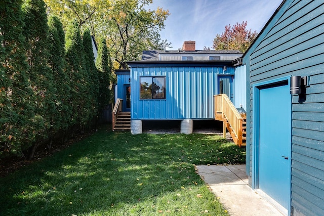 3909 Xerxes Ave S, Minneapolis, MN 55410 - view of grassy yard featuring entry steps