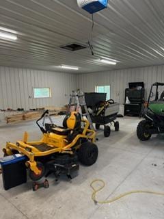 40815 Shadow Dr, Clitherall, MN 56524 - garage featuring a garage door opener