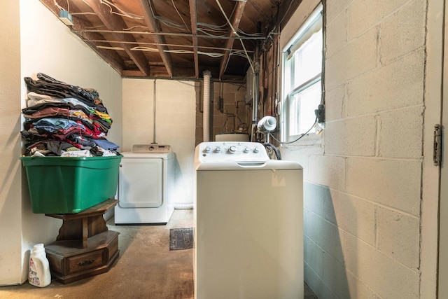 505 1st Ave SE, Pelican Rapids, MN 56572 - laundry area with independent washer and dryer and concrete block wall