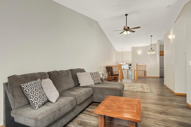 2721 230th Ct NW, Saint Francis, MN 55070 - living area featuring ceiling fan, a chandelier, high vaulted ceiling, and wood finished floors