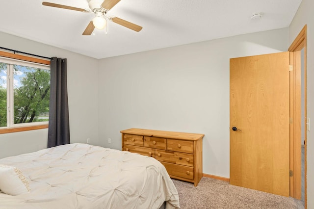 2721 230th Ct NW, Saint Francis, MN 55070 - bedroom featuring light colored carpet and ceiling fan