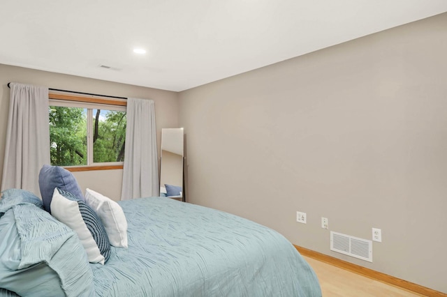 2721 230th Ct NW, Saint Francis, MN 55070 - bedroom with light wood-style flooring and recessed lighting