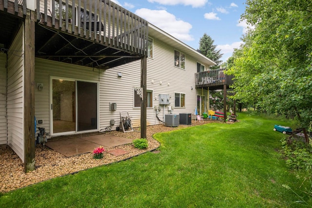 2721 230th Ct NW, Saint Francis, MN 55070 - rear view of house featuring a yard, a patio area, and a deck
