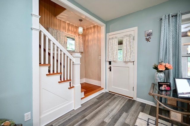 231 Mark St, Winona, MN 55987 - entryway featuring wood finished floors, stairs, and plenty of natural light